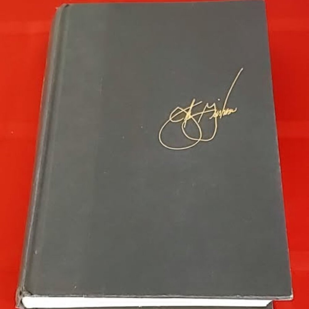 1995, THE RAIN MAKER BY JOHN GRISHAM, HARD COVER!!!